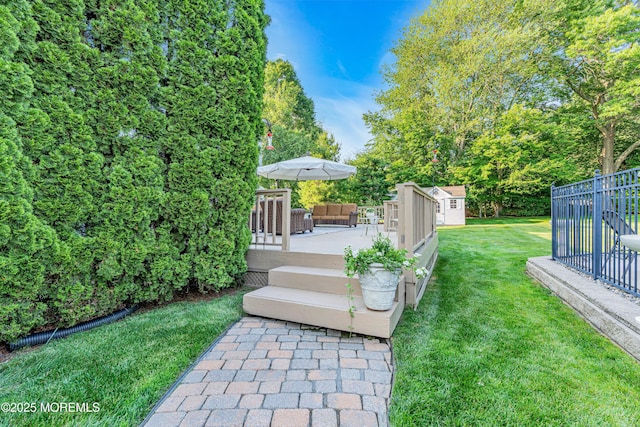 3058 Governors Xing, Wall, NJ 07719 - view of yard with a storage unit, a wooden deck, and an outdoor hangout area