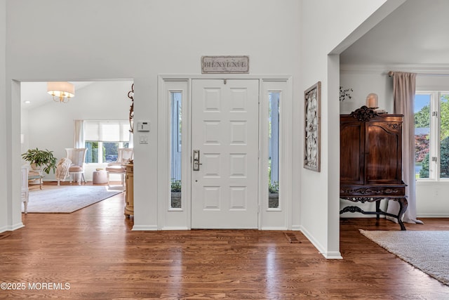 3058 Governors Xing, Wall, NJ 07719 - entrance foyer with wood finished floors, a chandelier, and a towering ceiling