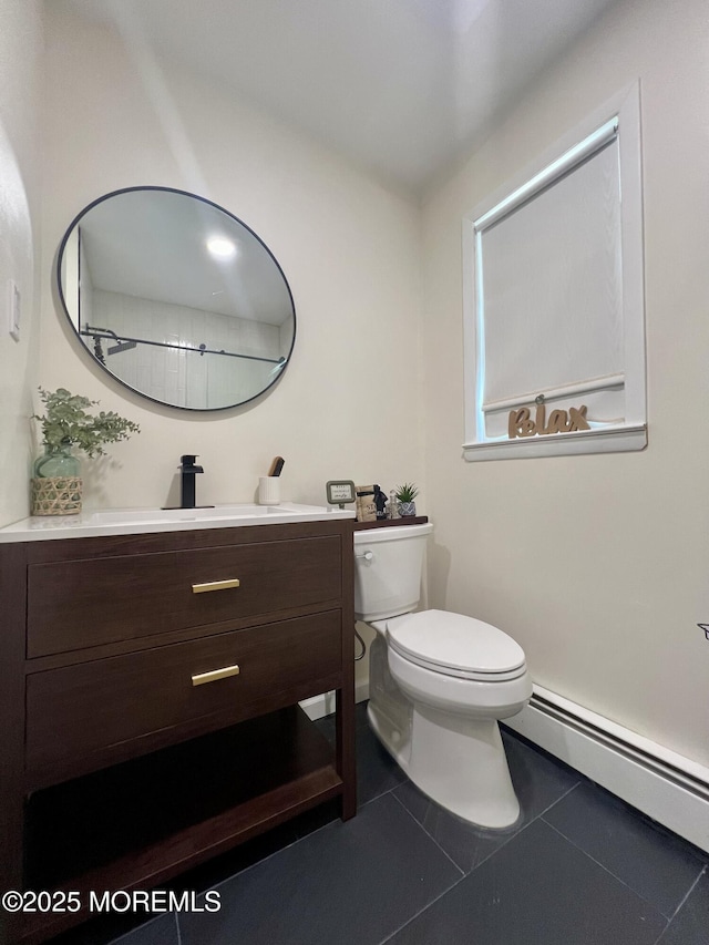 31 Guadeloupe Dr, Toms River, NJ 08757 - bathroom with a baseboard radiator, vanity, and tile patterned floors