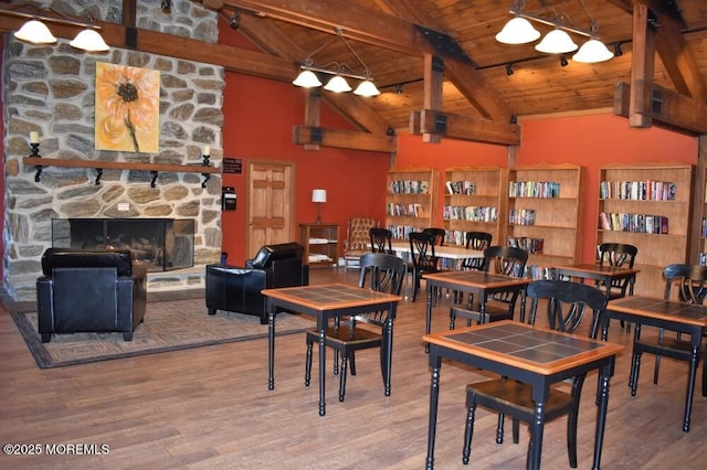 31 Guadeloupe Dr, Toms River, NJ 08757 - dining space featuring wood ceiling, wood finished floors, and a stone fireplace