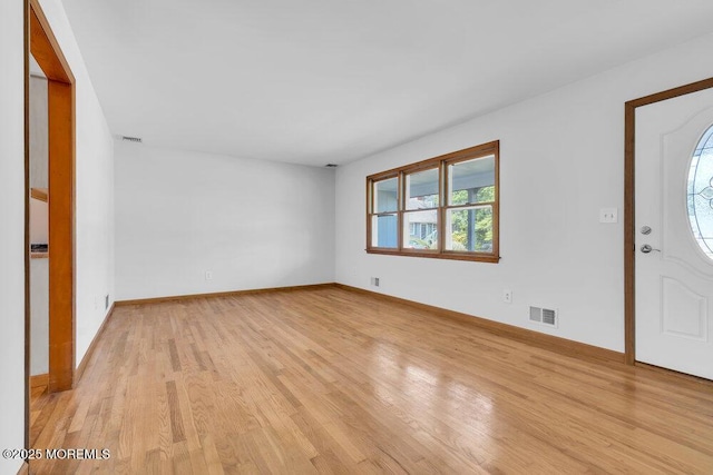 1131 Canal Dr, Point Pleasant, NJ 08742 - foyer with healthy amount of natural light and light wood-type flooring