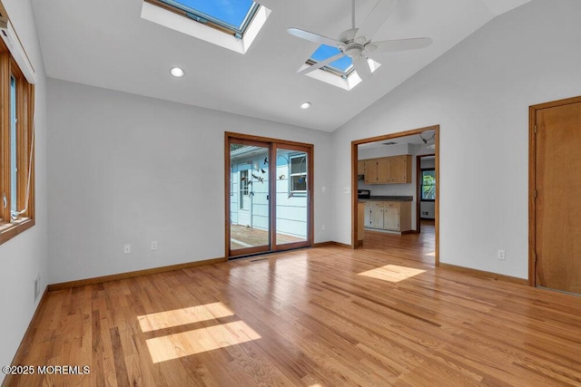 1131 Canal Dr, Point Pleasant, NJ 08742 - unfurnished room featuring a skylight, light wood-style flooring, recessed lighting, high vaulted ceiling, and ceiling fan