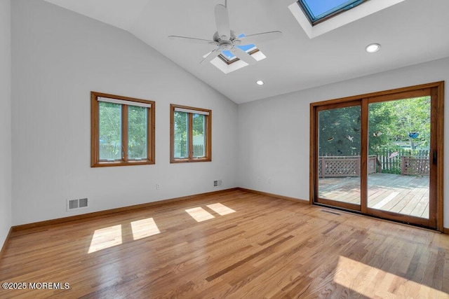 1131 Canal Dr, Point Pleasant, NJ 08742 - unfurnished room featuring a skylight, lofted ceiling, light wood-type flooring, ceiling fan, and recessed lighting