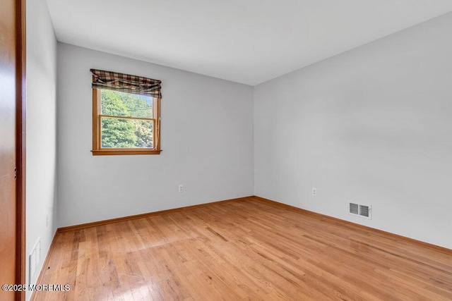 1131 Canal Dr, Point Pleasant, NJ 08742 - empty room featuring light wood finished floors and baseboards