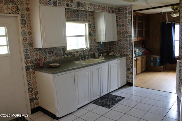 146 Mockingbird Way, Whiting, NJ 08759 - kitchen featuring light tile patterned flooring, white cabinetry, glass insert cabinets, and dark countertops