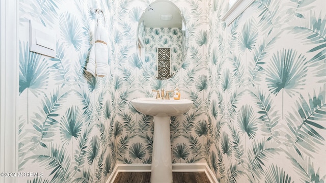 10 Victoria Gardens Sq, Neptune Township, NJ 07753 - half bathroom featuring wallpapered walls and wood finished floors