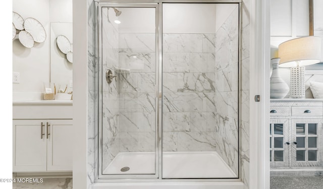 10 Victoria Gardens Sq, Neptune Township, NJ 07753 - bathroom featuring a stall shower, vanity, and marble look tile flooring