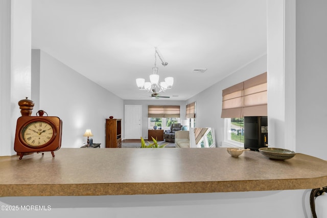 65 Sycamore Rd, Manahawkin, NJ 08050 - kitchen with a chandelier and hanging light fixtures