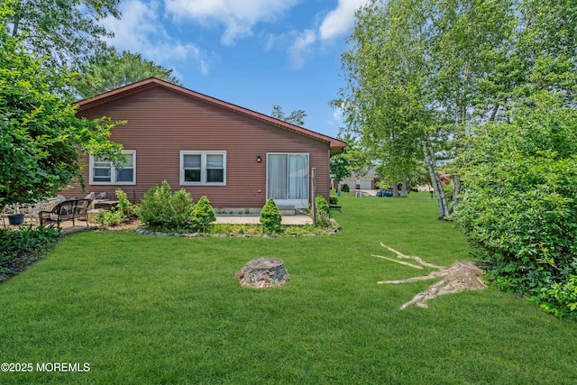 65 Sycamore Rd, Manahawkin, NJ 08050 - back of house with a lawn and a patio area
