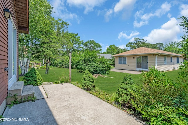65 Sycamore Rd, Manahawkin, NJ 08050 - view of green lawn featuring a patio area