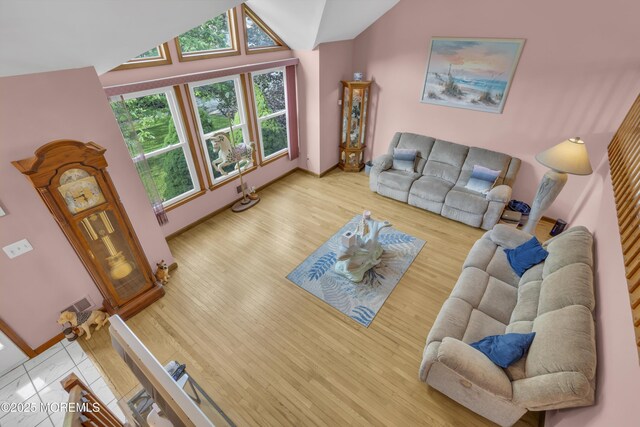26 Shasta Ln, Toms River, NJ 08753 - living area featuring lofted ceiling and wood finished floors