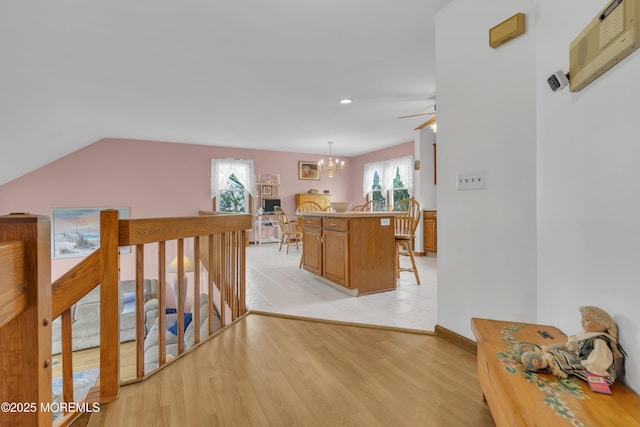 26 Shasta Ln, Toms River, NJ 08753 - corridor featuring a chandelier, recessed lighting, light wood-style flooring, and lofted ceiling