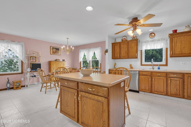 26 Shasta Ln, Toms River, NJ 08753 - kitchen with dishwasher, a breakfast bar area, brown cabinetry, and recessed lighting