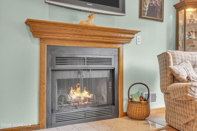 26 Shasta Ln, Toms River, NJ 08753 - detailed view of a warm lit fireplace