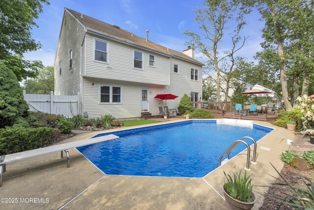 26 Shasta Ln, Toms River, NJ 08753 - view of swimming pool featuring a deck, entry steps, and a diving board