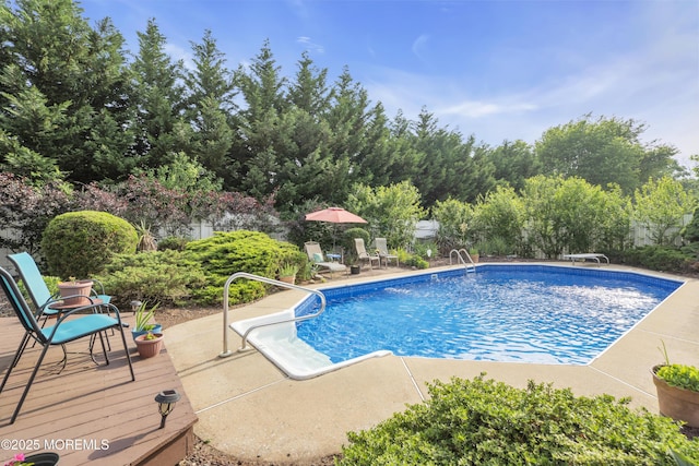 26 Shasta Ln, Toms River, NJ 08753 - swimming pool with a patio, a diving board, and view of scattered trees