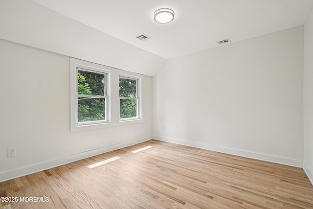 24 Tuers Pl, Upper Montclair, NJ 07043 - empty room with light wood-style floors and lofted ceiling
