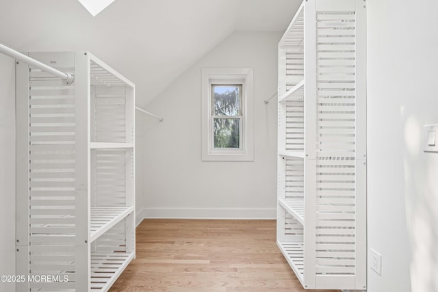 24 Tuers Pl, Upper Montclair, NJ 07043 - spacious closet with vaulted ceiling and wood finished floors