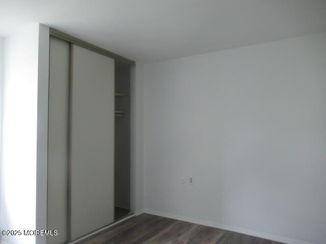 10 Dunstable Rd, Vincentown, NJ 08088 - unfurnished bedroom featuring dark wood finished floors and a closet