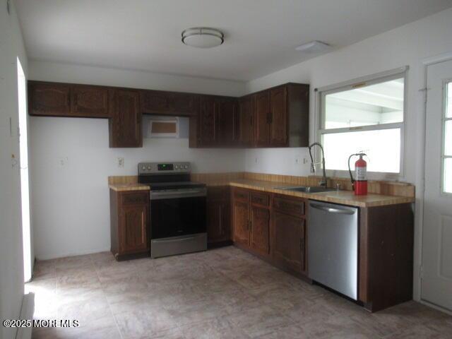 10 Dunstable Rd, Vincentown, NJ 08088 - kitchen with stainless steel appliances and light countertops
