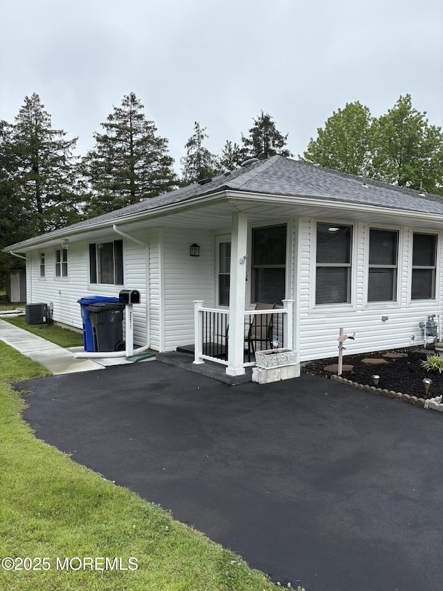 2211 Yorktowne Blvd, Toms River, NJ 08753 - view of front of property with covered porch and a shingled roof