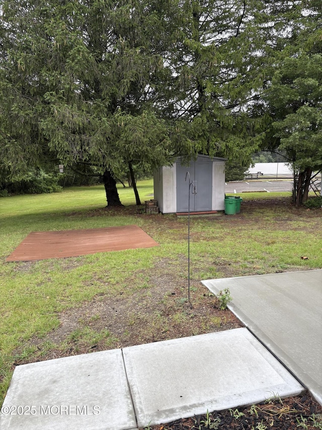 2211 Yorktowne Blvd, Toms River, NJ 08753 - view of green lawn with a storage unit