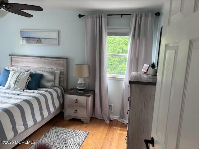 11 Bristlecone Dr, Howell, NJ 07731 - bedroom featuring light wood-style flooring and ceiling fan