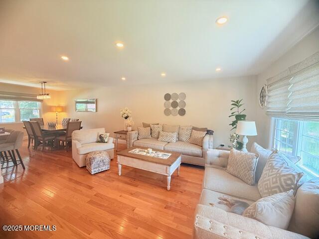 11 Bristlecone Dr, Howell, NJ 07731 - living room with light wood finished floors and recessed lighting