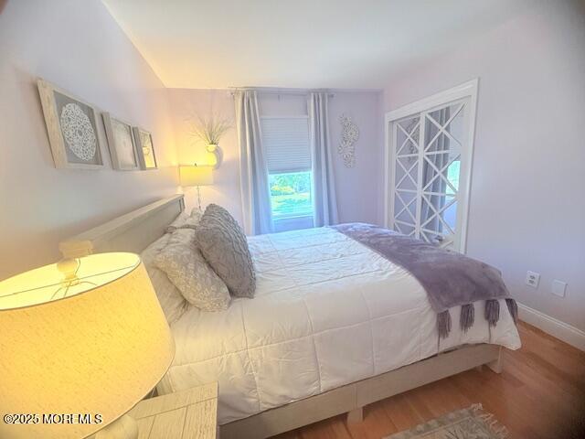 11 Bristlecone Dr, Howell, NJ 07731 - bedroom with wood finished floors and baseboards
