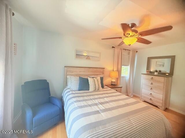 11 Bristlecone Dr, Howell, NJ 07731 - bedroom with light wood-style flooring and ceiling fan