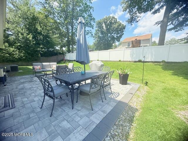 11 Bristlecone Dr, Howell, NJ 07731 - fenced backyard featuring a patio area and outdoor dining space