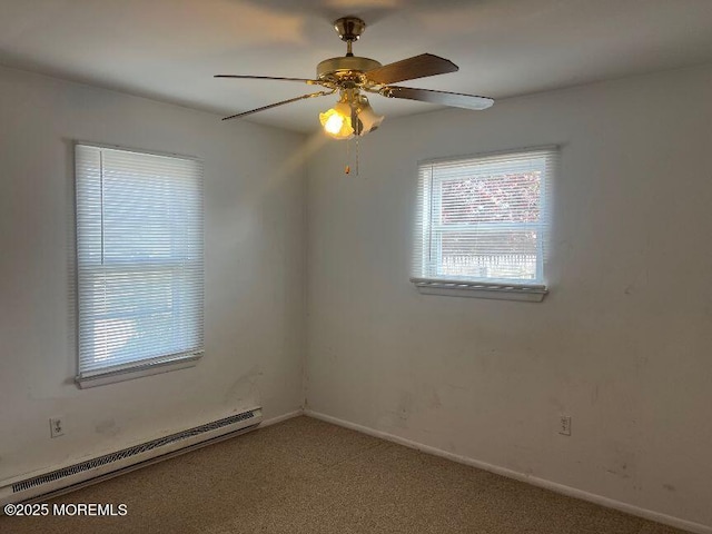 1209 Plover Ct, Forked River, NJ 08731 - carpeted spare room with a baseboard radiator and a ceiling fan