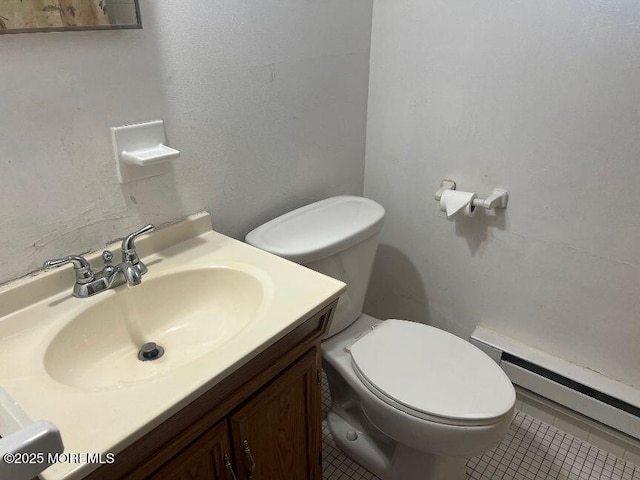 1209 Plover Ct, Forked River, NJ 08731 - half bathroom featuring baseboard heating, tile patterned floors, and vanity