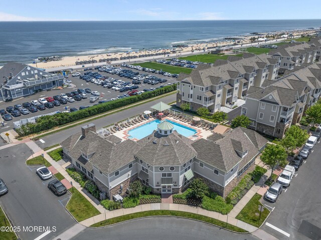 22 Cooper Ave Unit 113, Long Branch, NJ 07740 - drone / aerial view of a large body of water and a pool