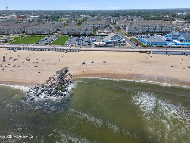 22 Cooper Ave Unit 113, Long Branch, NJ 07740 - drone / aerial view of waterfront with a beach