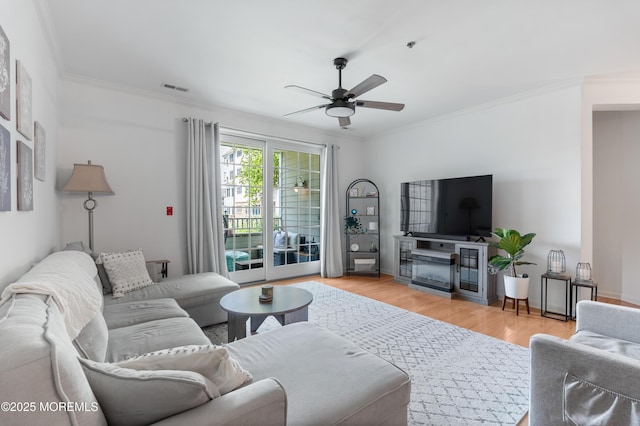 22 Cooper Ave Unit 113, Long Branch, NJ 07740 - living room with ceiling fan, crown molding, and light wood-style flooring