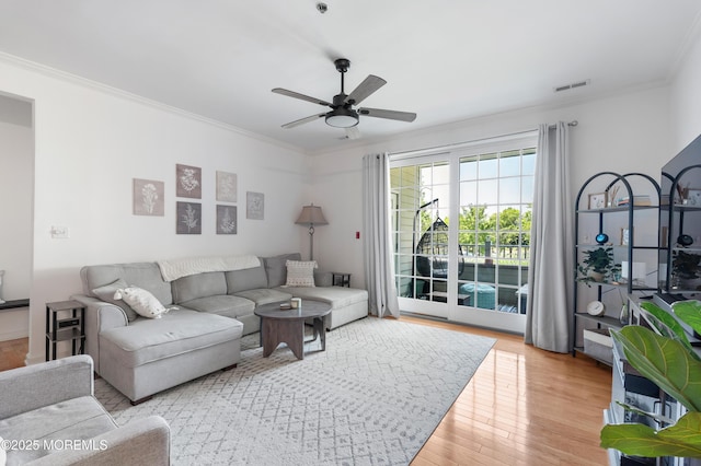22 Cooper Ave Unit 113, Long Branch, NJ 07740 - living room featuring ornamental molding, ceiling fan, and light wood-style flooring