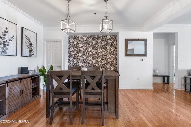 22 Cooper Ave Unit 113, Long Branch, NJ 07740 - dining room featuring light wood finished floors and crown molding