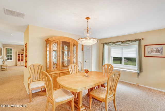 406 Betsy Ross Ln, Little Egg Harbor, NJ 08087 - dining space featuring light carpet and a chandelier