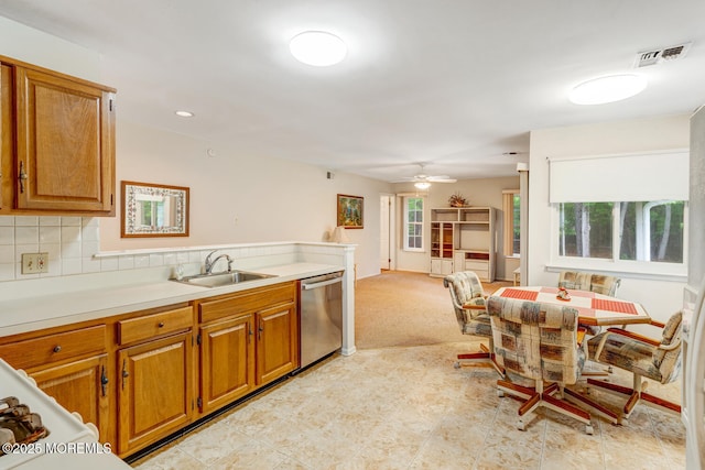 406 Betsy Ross Ln, Little Egg Harbor, NJ 08087 - kitchen featuring dishwasher, healthy amount of natural light, brown cabinets, and light countertops