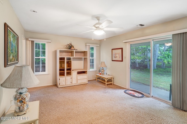 406 Betsy Ross Ln, Little Egg Harbor, NJ 08087 - living area with carpet flooring, plenty of natural light, and ceiling fan