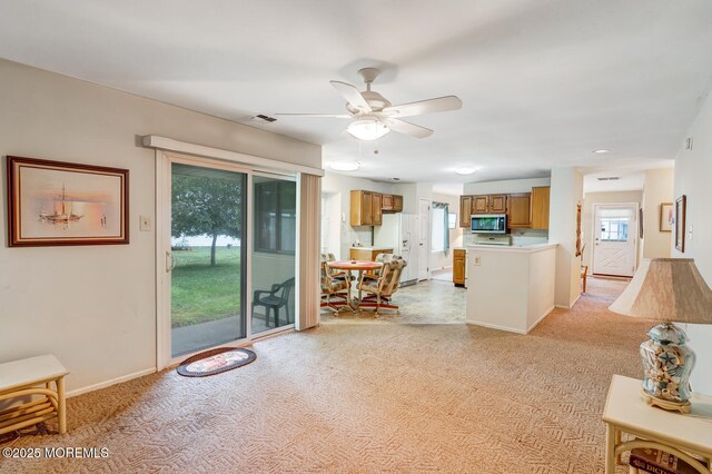 406 Betsy Ross Ln, Little Egg Harbor, NJ 08087 - living room featuring ceiling fan and light colored carpet