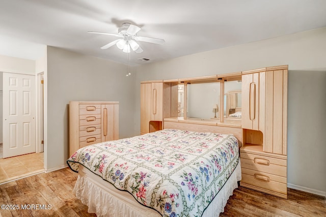 406 Betsy Ross Ln, Little Egg Harbor, NJ 08087 - bedroom with wood finished floors and ceiling fan