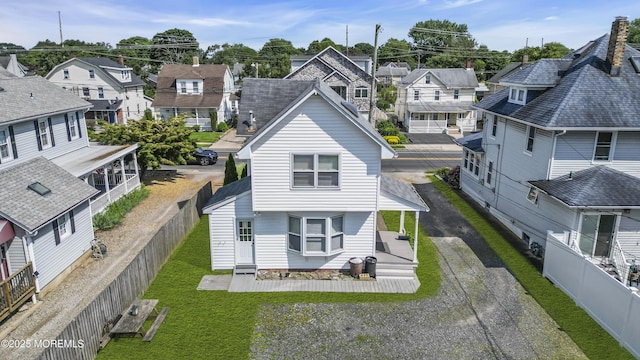 59591/2 Taylor Ave, Manasquan, NJ 08736 - rear view of house featuring a residential view, a fenced backyard, and driveway