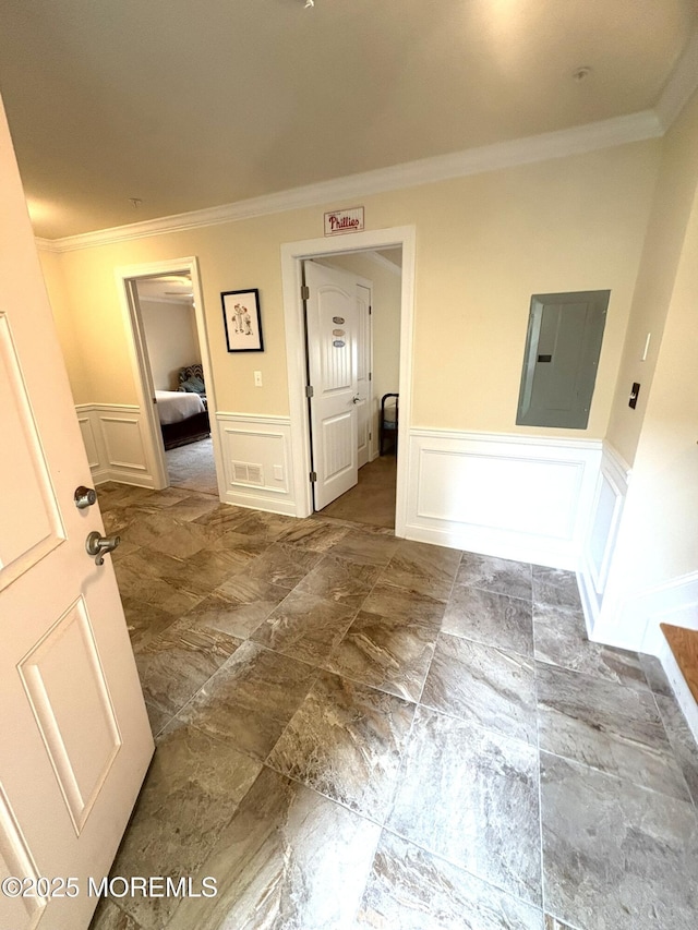 119 Dupont Ave Unit 10, Seaside Heights, NJ 08751 - unfurnished room with electric panel, crown molding, a decorative wall, and a wainscoted wall