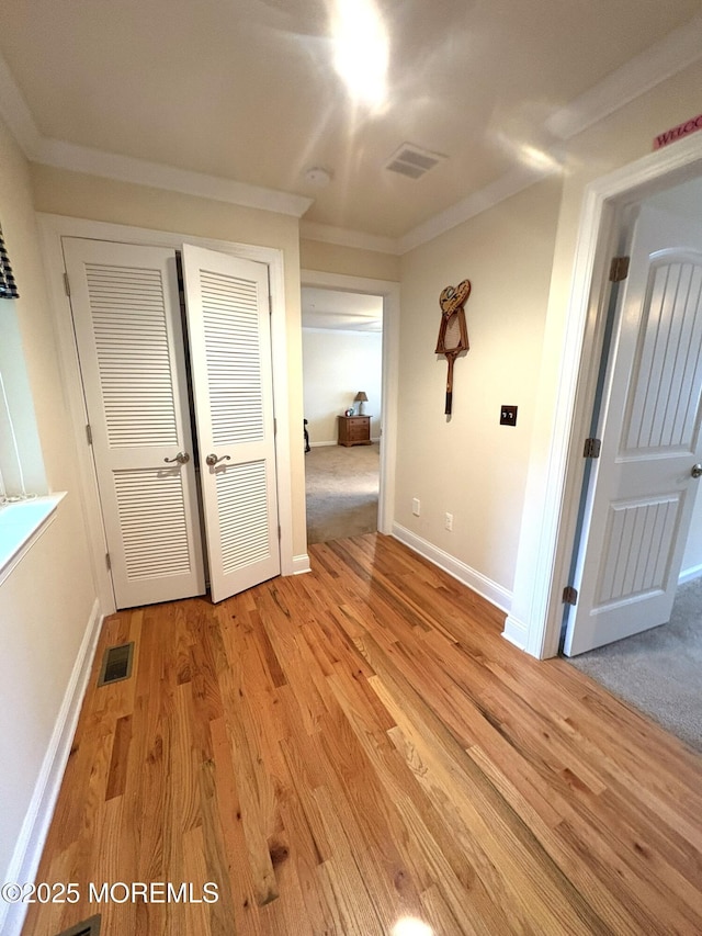 119 Dupont Ave Unit 10, Seaside Heights, NJ 08751 - unfurnished room featuring light wood-type flooring and ornamental molding