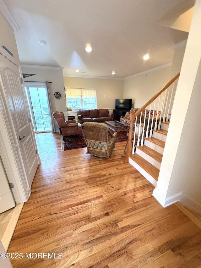 119 Dupont Ave Unit 10, Seaside Heights, NJ 08751 - living area with crown molding, light wood-type flooring, stairway, and recessed lighting