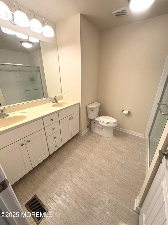 119 Dupont Ave Unit 10, Seaside Heights, NJ 08751 - bathroom with a shower stall and double vanity