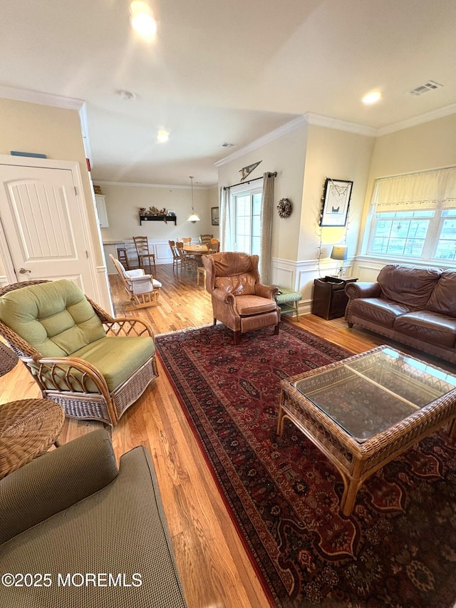 119 Dupont Ave Unit 10, Seaside Heights, NJ 08751 - living room with wood finished floors, crown molding, wainscoting, and recessed lighting