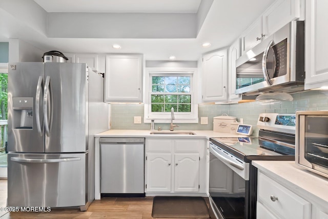5 Poplar St, Jackson, NJ 08527 - kitchen featuring stainless steel appliances, white cabinetry, and recessed lighting